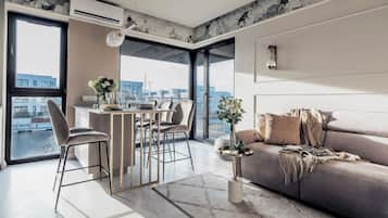Deluxe Apartment | Living room | Smart TV
