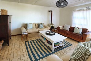 Casa Comfort | Area soggiorno | Caminetto