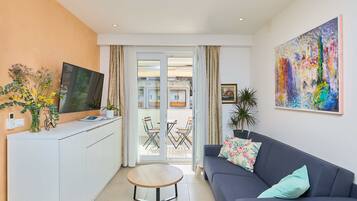 Apartment (2 Bedrooms) | Living room | 140-cm Smart TV with cable channels