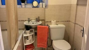 Family Apartment, 2 Bedrooms | Bathroom | Combined shower/bathtub, deep-soaking bathtub, towels, toilet paper