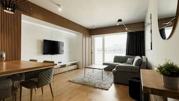 Business Apartment | Ruang tamu | TV skrin rata, lantai dipanaskan