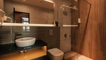 Shower, free toiletries, hair dryer, slippers