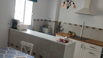 Cabin | Private kitchen | Coffee/tea maker, mini-fridge, microwave, electric kettle