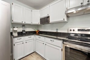 Fridge, oven, coffee/tea maker, toaster