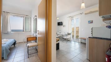 Deluxe Apartment, Sea View | 1 bedroom, in-room safe, soundproofing, iron/ironing board