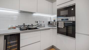 Apartment | Private kitchen | Fridge, microwave, oven, stovetop