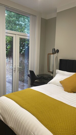 1 bedroom, desk, iron/ironing board, travel cot