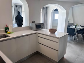 Fridge, microwave, oven, dishwasher - Sitges Port View Apartment by Hello Homes Sitges (Sitges)
