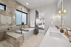 Shower, hair dryer, towels, shampoo