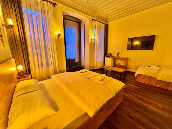 Standard Family Room | Premium bedding, minibar, desk, laptop workspace