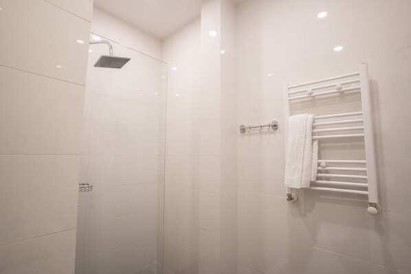 Shower, towels, soap, shampoo