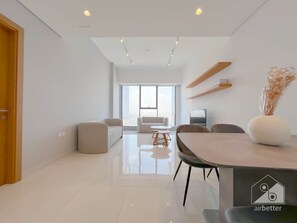 55-inch plasma TV with satellite channels - Luxury 1B With Balcony in Blue Wave Tower Dubai (Dubai)