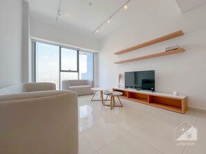 55-inch plasma TV with satellite channels - Luxury 1B With Balcony in Blue Wave Tower Dubai (Dubai)