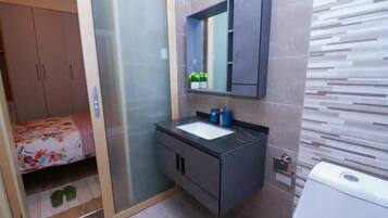 Hair dryer, towels, soap, shampoo