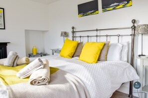 4 slaapkamers, een strijkplank/strijkijzer, beddengoed