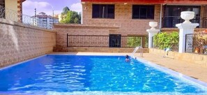Indoor pool, a heated pool - Cozy - 4 bedroom Luxury furnished apartment (Nairobi)
