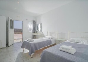 Deluxe Triple Room | 2 bedrooms, in-room safe, individually decorated, individually furnished