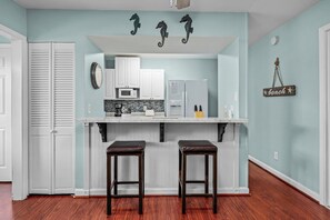 Fridge, microwave, oven, stovetop - Gulf Terrace #2007 | by Salt Water Vacations (Destin)
