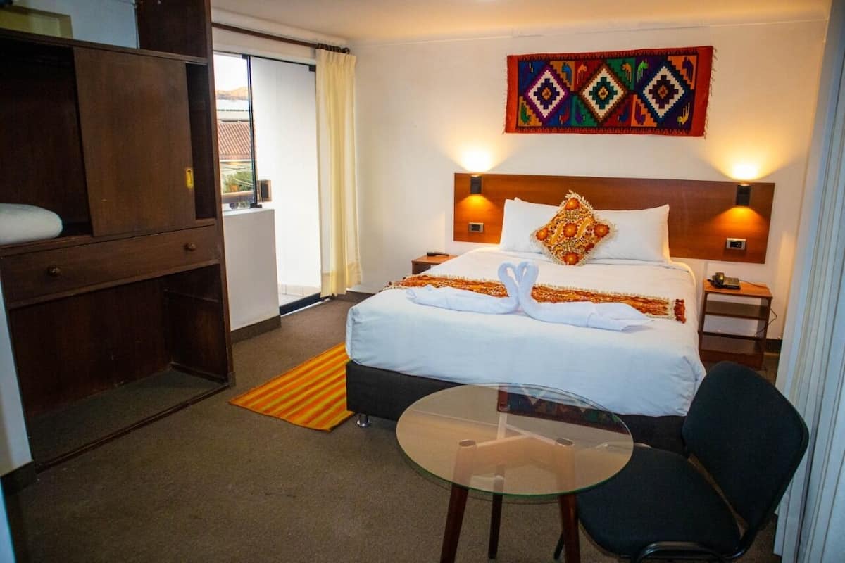 Panoramic Room, City View | 1 bedroom, down comforters, in-room safe, desk