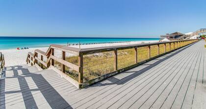 Lakefront Mediterranean-style home with pool, tennis & 6-seater golf cart