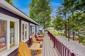 Property grounds - Lakefront cabin with deck, gas grill, kayaks, fireplace, & quick beach access (Laconia)