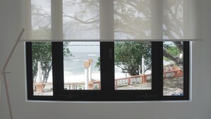 Interior - Oceanfront Balcony King Bed suite steps to city center and beach Sunsets walks (Hatillo)