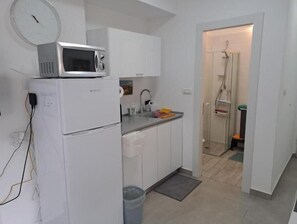 Fridge, microwave, coffee/tea maker, electric kettle