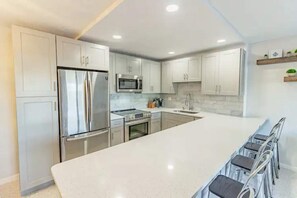 Private kitchen - Modern Condo on the Beach in the Heart of Cocoa! (Cocoa Beach)