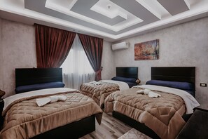 Πουπουλένια παπλώματα, μίνι μπαρ, μοναδική διακόσμηση, δωρεάν Wi-Fi