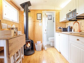 Fridge, electric kettle, toaster, cookware/dishes/utensils