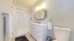Shower, hair dryer, towels, soap