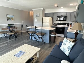 Condo, 1 King Bed (9A, Resting Beach Face) | Living area | TV, stereo