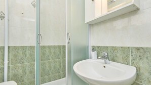 A bathroom with a shower, toilet, and sink. - 5 Double room Villa Kate Dadić (Dubrovnik)
