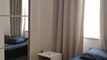 1 habitación, tabla de planchar con plancha, wifi y ropa de cama