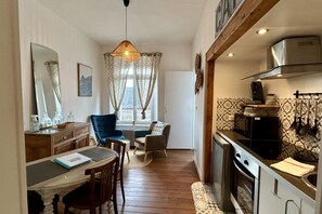 Microwave, stovetop, coffee/tea maker, cookware/dishes/utensils