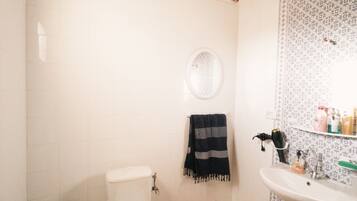 Hair dryer, towels, soap, toilet paper