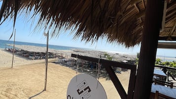 On the beach, white sand, free beach shuttle, beach bar