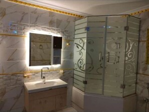 Hair dryer, bidet, towels, soap