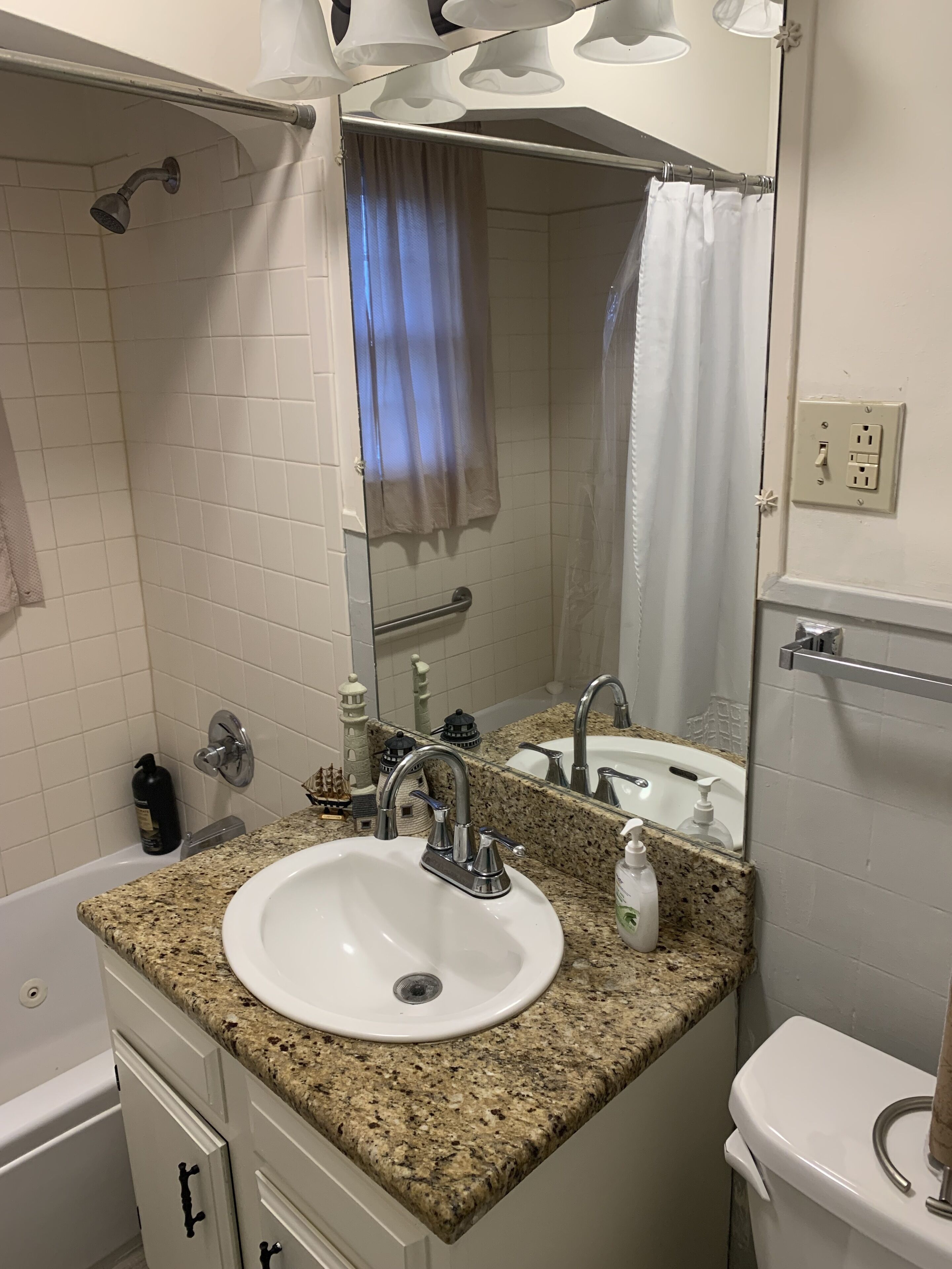 Jetted tub, hair dryer, towels, soap