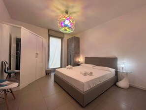 1 habitación, tabla de planchar con plancha, wifi gratis y ropa de cama 