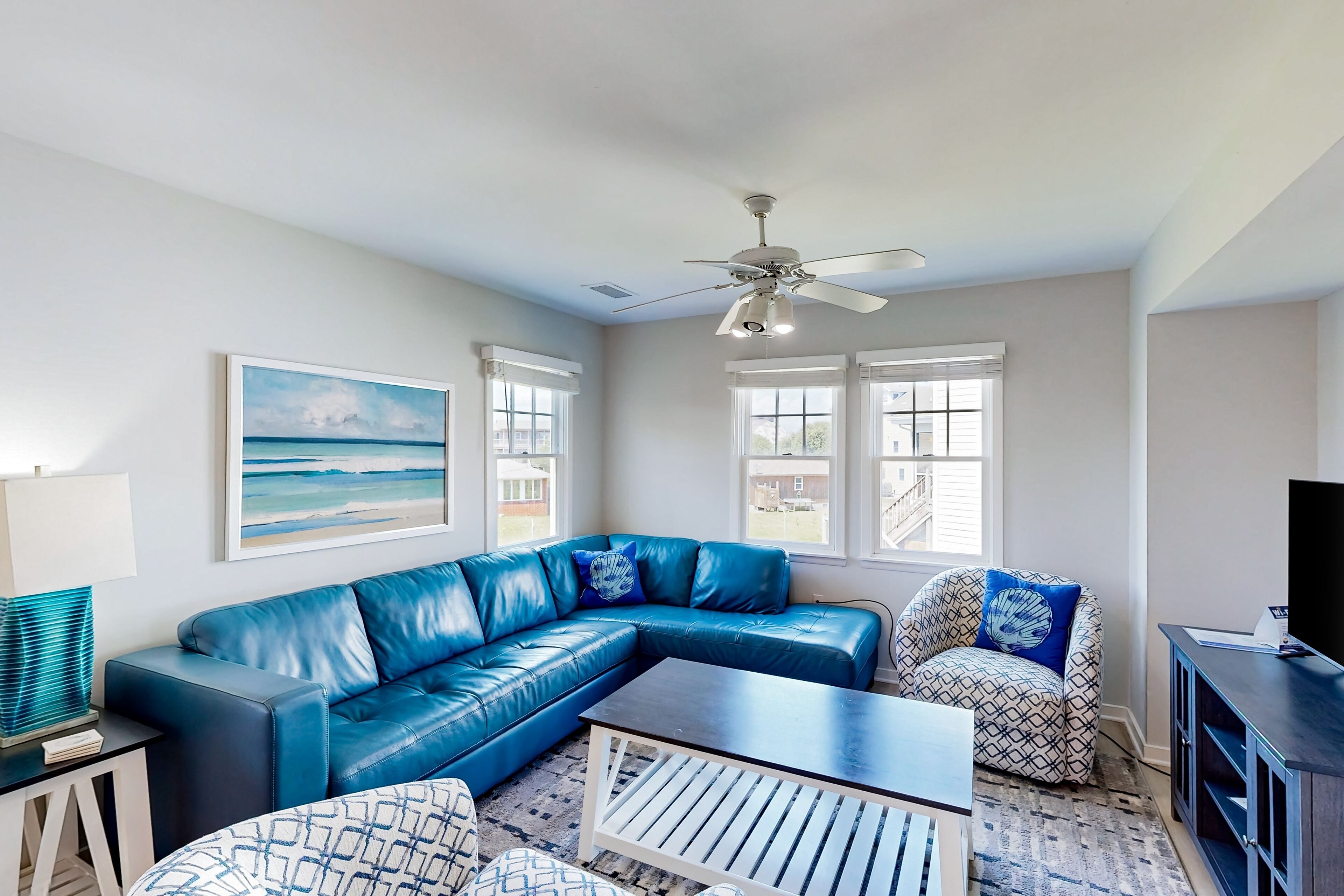 Dog-friendly townhouse with pool, playground, basketball, beach access, deck, AC