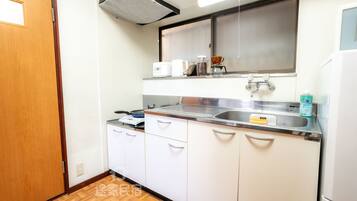 Fridge, microwave, high chair, cookware/dishes/utensils