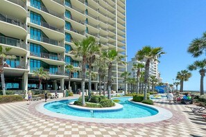 A heated pool - BEACHFRONT LUXURY, INDOOR/OUTDOOR POOL AND SAUNA, FAMILY FRIENDLY - Phoenix West 1507 (Orange Beach)