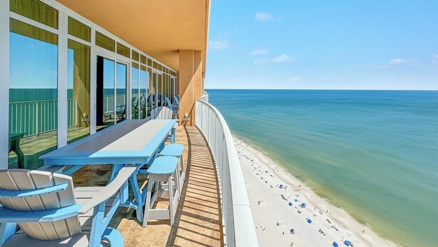 A balcony with a view of the beach and ocean. - ULTRA LUXURY BEACHFRONT CONDO, 3500SQFT, CUSTOM EVERYTHING (Orange Beach)