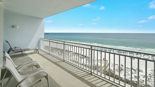 A balcony with a view of the beach and ocean. - BEACHFRONT, LOW DENSITY CONDO, CORNER UNIT, CLOSE TO RESTAURANTS - The Colonnades 703 (Gulf Shores)