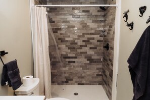 Shower, towels, soap, shampoo