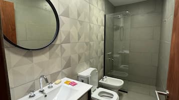Shower, bidet, towels, soap