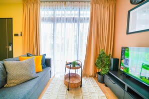 Premium Studio Suite | Living area | 45-inch Smart TV with digital channels, smart speakers - Hangouts Urban Eco Langkawi (Langkawi)