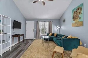 Living area - NEW PROMO Pricing-3 Rooms, 2 Laughs, 1 Cozy Choice (Lenexa)