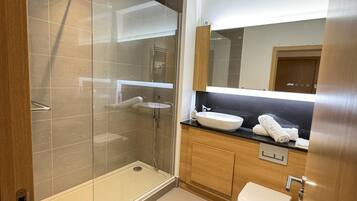 Shower, free toiletries, hair dryer, towels